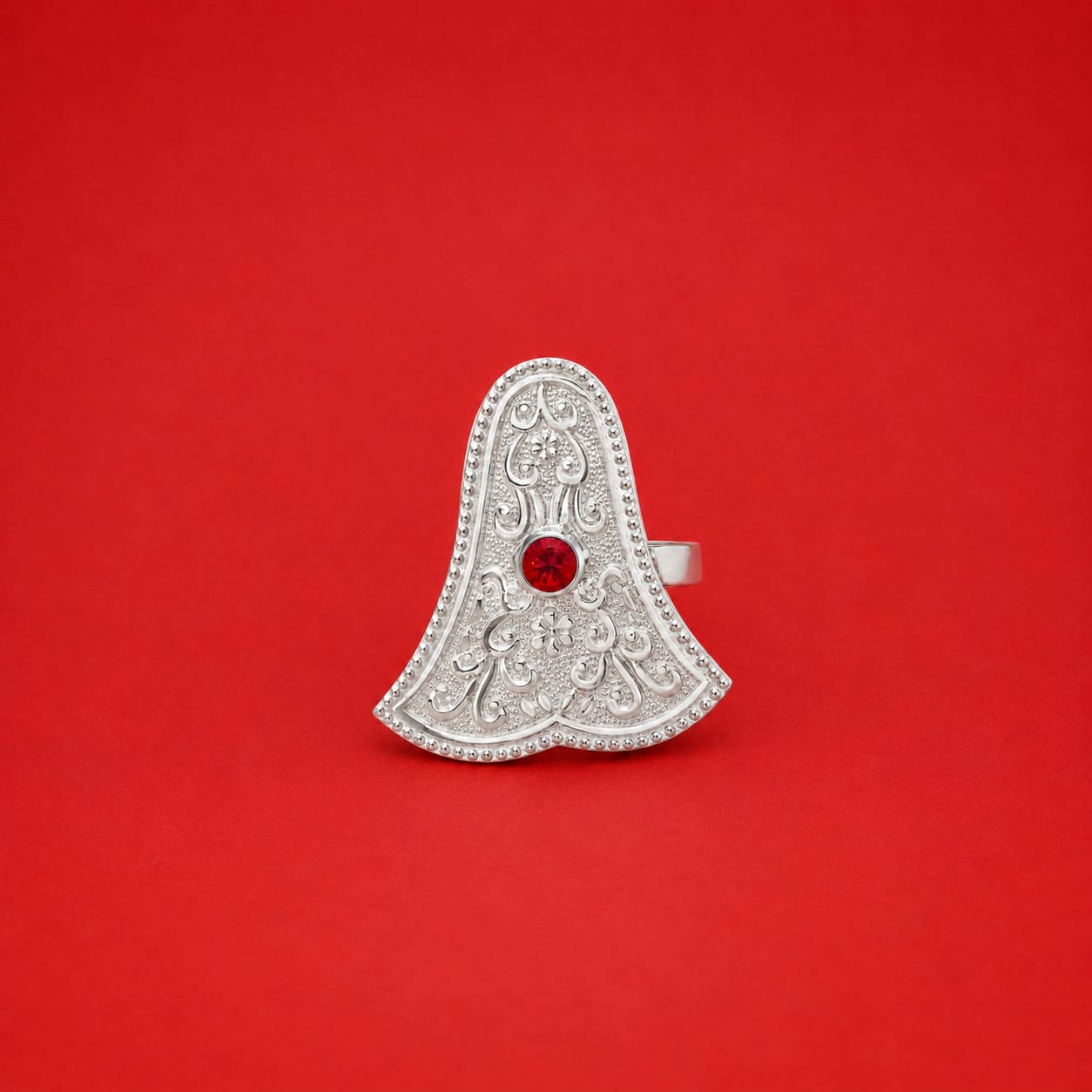 Silver Ganpati Sond Traditional Abhushan on red background